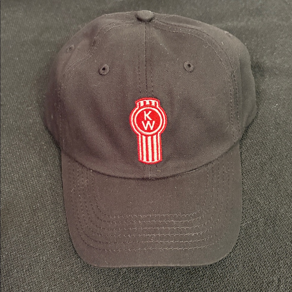 Kenworth baseball cap. Black cap with red and white patch